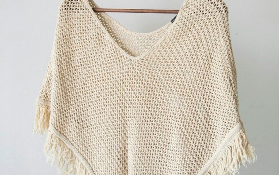 Layered neutral clothing ensemble featuring wool and soft knits