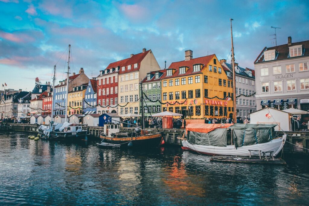 Copenhagen canal with colorful historic townhouses and clean water
