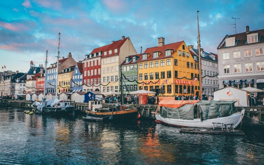 Copenhagen canal with colorful historic townhouses and clean water