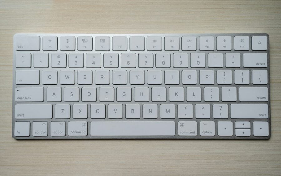 Custom mechanical keyboard with neutral artisan keycaps