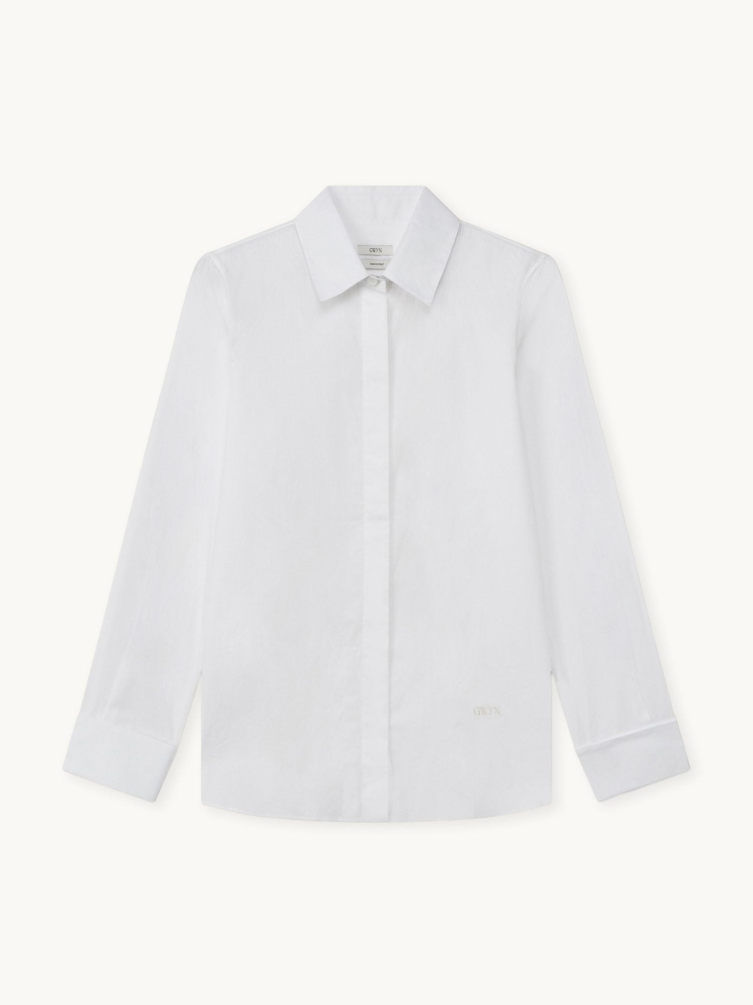 White long-sleeve button-up shirt with pointed collar and mother-of-pearl buttons