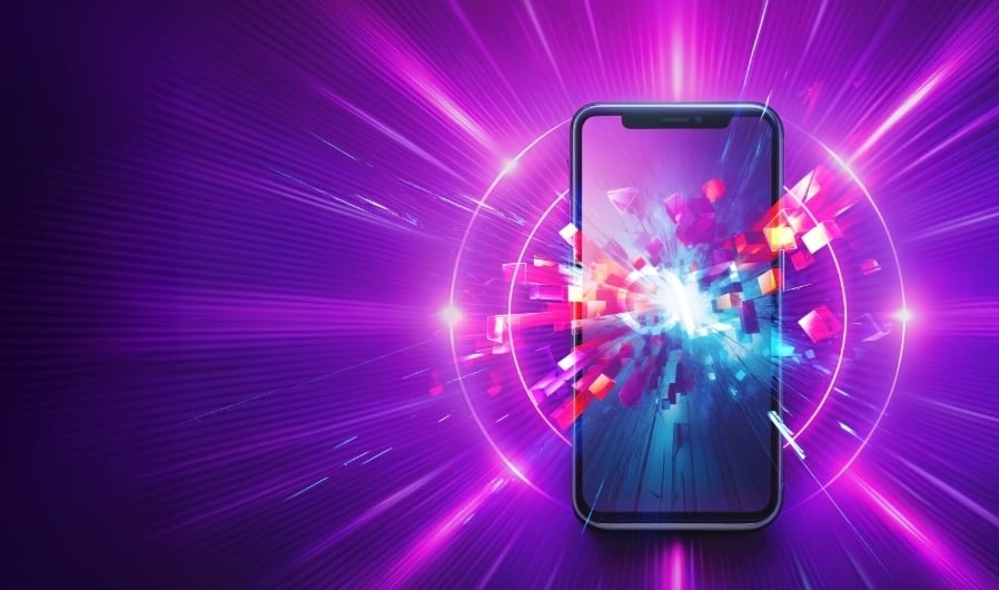 Smartphone displaying colorful abstract digital explosion of pixels and light bursts with magenta radiance